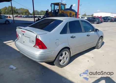 2003 Ford Focus Zts z USA, uszkodzony, nr VIN 1FAFP38373W231345